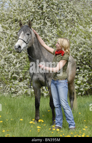 young woman with arabian horse Stock Photo