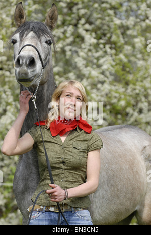 young woman with arabian horse Stock Photo