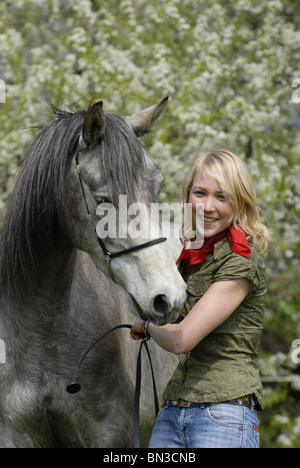 young woman with arabian horse Stock Photo