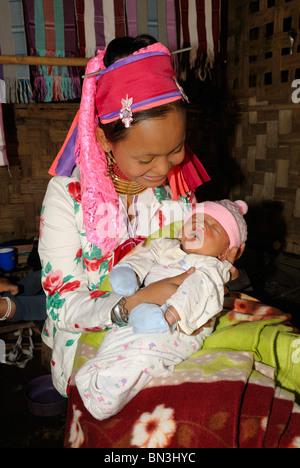 Kayan (ethnic minority) woman also called longneck with her baby, Mae Hong Son, Northern Thailand, Asia Stock Photo
