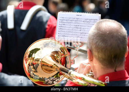 Rear view of man playing trumpet Stock Photo