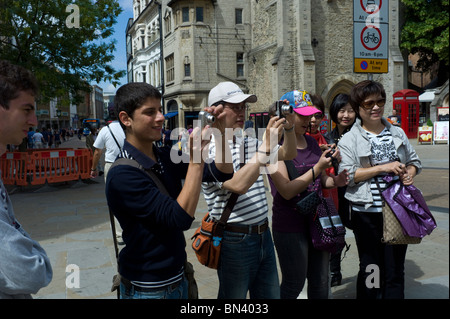 Tourists taking photographs in Oxford Stock Photo