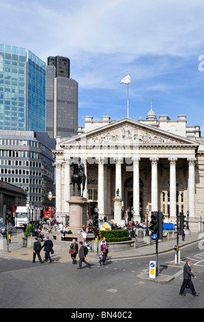The Duke of Wellington equestrian statue in front of The historical Royal Exchange colonnade building bank road junction City of London England UK Stock Photo