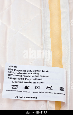 Washing instructions on a zipped foam pillow Stock Photo