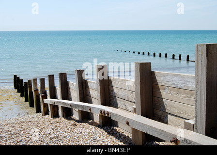 Wooden groyne (groin) sea defences on the shingle beach at Bognor Regis, West Sussex, England Stock Photo