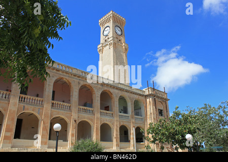 Clock Tower in the former British Military Hospital at Mtarfa (Imtarfa), central Malta. Buildings are now private residences. Stock Photo