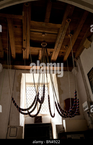 bell ropes at the bottom of the bell tower in St Mary's Church, Selborne Stock Photo