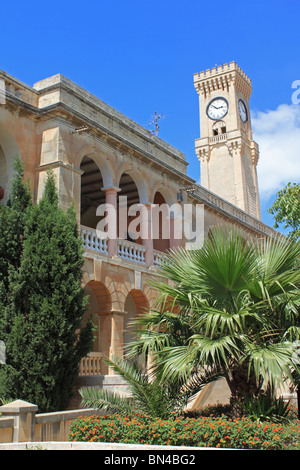 Clock Tower in the former British Military Hospital at Mtarfa (Imtarfa), central Malta. Buildings are now private residences. Stock Photo