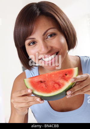 GIRL EATING WATERMELON Stock Photo