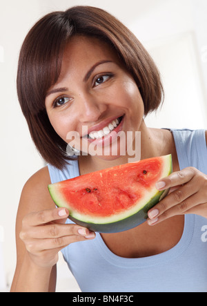 GIRL EATING WATERMELON Stock Photo