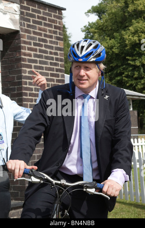Balfour Beatty London Youth Games 2010; London Mayor Boris Johnson on bicycle Stock Photo