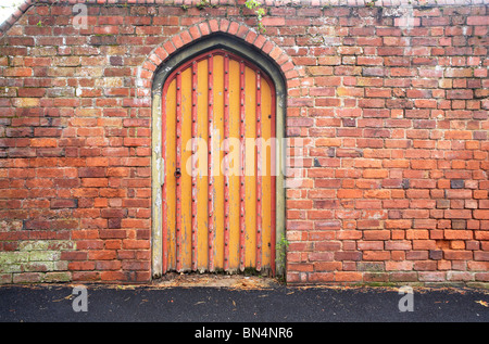 Arched garden wall doorway