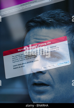 Phishing site on computer screen with businessman reflection Stock Photo