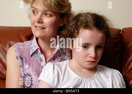 Margaret Lambton with her autistic daughter Harriet, aged 8yrs, at Brampton, Cambridgeshire Stock Photo