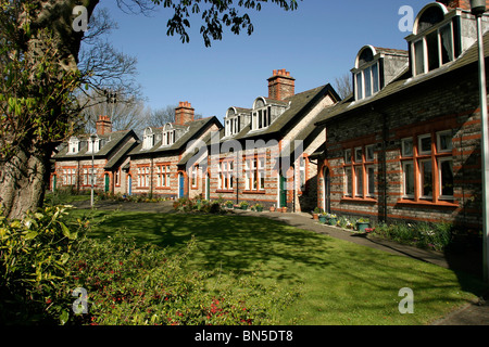 England, Cheshire, Stockport, Heaton Moor, Charity, Victorian Ainsworth Almshouses in Green Lane Stock Photo