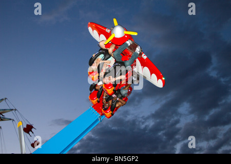 Pulling Gs after dark on the thrilling Air Race ride at the new Luna Park in Coney Island, Brooklyn Stock Photo