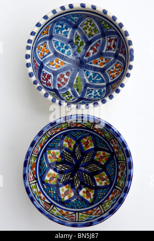 Traditional patterned Berber pottery produced in the village of Guellala on the island of Djerba in Tunisia. Stock Photo