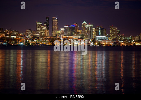 A Nighttime Seattle Skyline of Elliot Bay in the Puget Sound Stock Photo