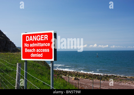 Warning sign: Danger Beach Closed Stock Photo