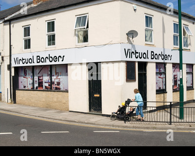 An empty shop decorated by the Local Council using large photographs to make it more attractive a so-called 'virtual Shop' Stock Photo