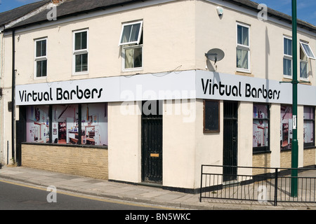 An empty shop decorated by the Local Council using large photographs to make it more attractive a so-called 'virtual Shop' Stock Photo