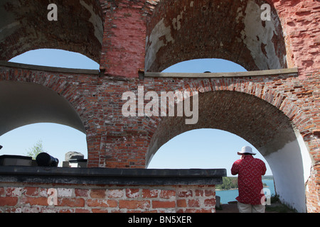 Tourists at the old Russian fortress Notvikstornet near Bomarsund on the Åland archipelago between Finland and Sweden Stock Photo