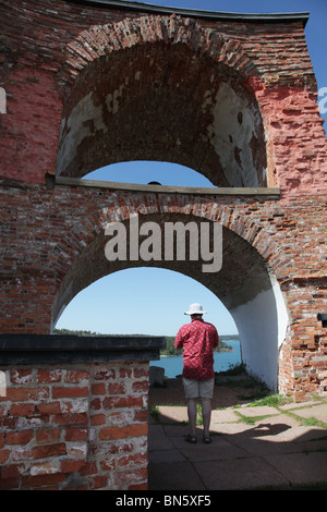 Tourists at the old Russian fortress Notvikstornet near Bomarsund on the Åland archipelago between Finland and Sweden Stock Photo