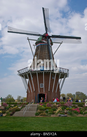 Tulip time festival Dutch Holland Michigan in USA  De Zwaan an authentic Dutch wooden windmill in Windmill Island during a trade fair Stock Photo
