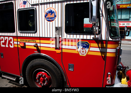 A New York Fire Department fire truck attending an emergency in Main Street Flushing New York Stock Photo