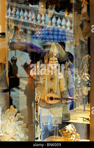 Puppet Touching Window puppet on display in the window Stock Photo - Alamy