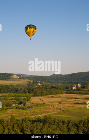 Hot air ballooning over Chateau de Marqueyssac & Chateau Les Milandes, Dordogne, France Stock Photo
