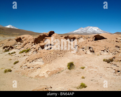 Volcanic rock formations in the southern altiplano desert near the Salar de Uyuni in Bolivia Stock Photo