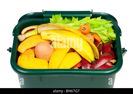 Food waste for composting in domestic recycling waste bin Stock Photo