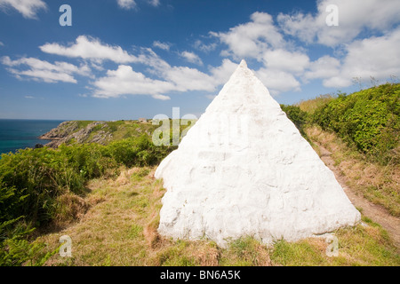 A cairn marking the point where the first submarine telegraph cable crossed from the UK, at Porthcurno to the USA. Stock Photo