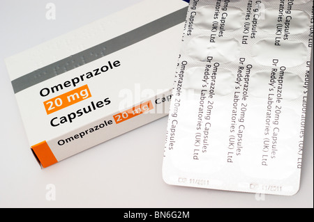 capsules containing Omeprazole as gastro - resistant granules Stock Photo