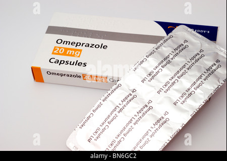 capsules containing Omeprazole as gastro - resistant granules Stock Photo