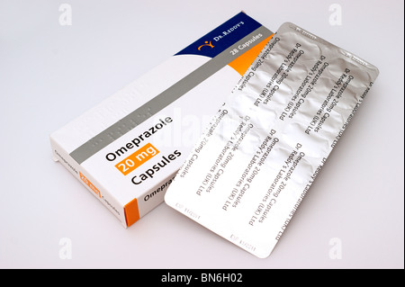 capsules containing Omeprazole as gastro - resistant granules Stock Photo