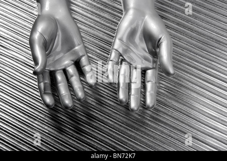hands open futuristic robot silver steel over gray background Stock Photo
