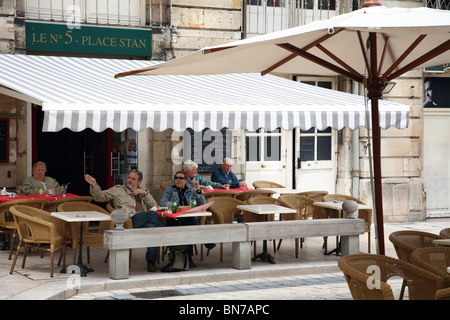 Guests in a street cafe in the Place Stanislas, Nancy, France Stock Photo