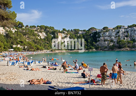 View of beach, limestone cliffs and cove, Cala Santa Galdana, Menorca, Spain Stock Photo