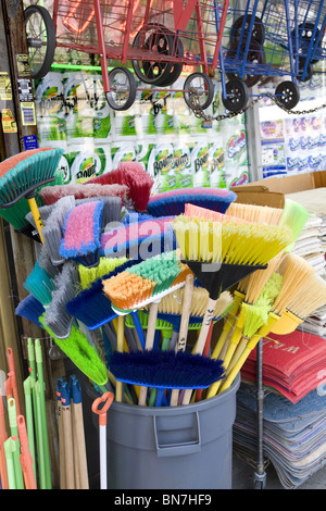 Colorful brooms for sale on the street at a 99 cent store in Brooklyn ...