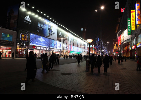 China, Beijing, Dongcheng District, Neon lights on Wangfujing Dajie - Beijing's Premier Shopping Street Stock Photo