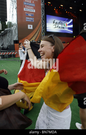 german supporters celebrating the victory over england at world cup fan fest village in rome, italy 27June 2010 Stock Photo