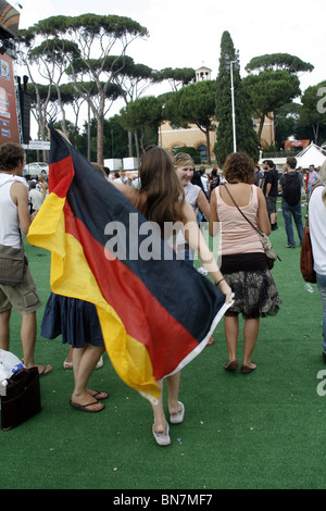 german supporters celebrating the victory over england at world cup fan fest village in rome, italy 27June 2010 Stock Photo