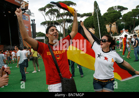 german supporters celebrating the victory over england at world cup fan fest village in rome, italy 27June 2010 Stock Photo