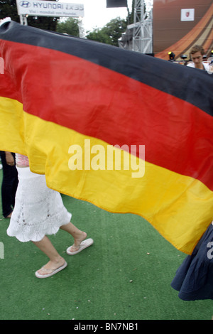 german supporters celebrating the victory over england at world cup fan fest village in rome, italy 27June 2010 Stock Photo