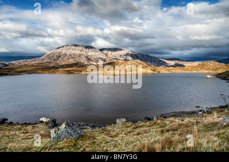 Loch stack, Sutherland in the north of Scotland along the A838 with evening sun on mountains Stock Photo