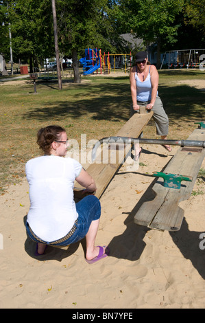 teeter totter is an example of perfect balance Stock Photo
