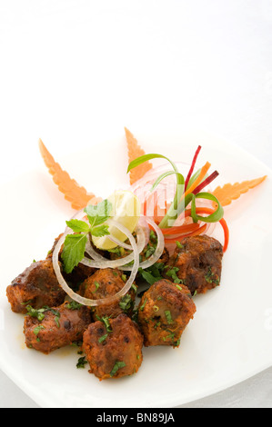 Mutton Boti Kebab - Tender morsels of kid lamb, marinated with traditional tandoori spices & honey & grilled on skewer Stock Photo