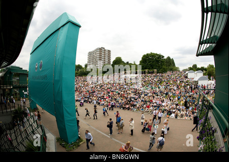 Crowds watch the big screen on Aorangi Terrace or Henman Hill during the Wimbledon Tennis Championships 2010 Stock Photo